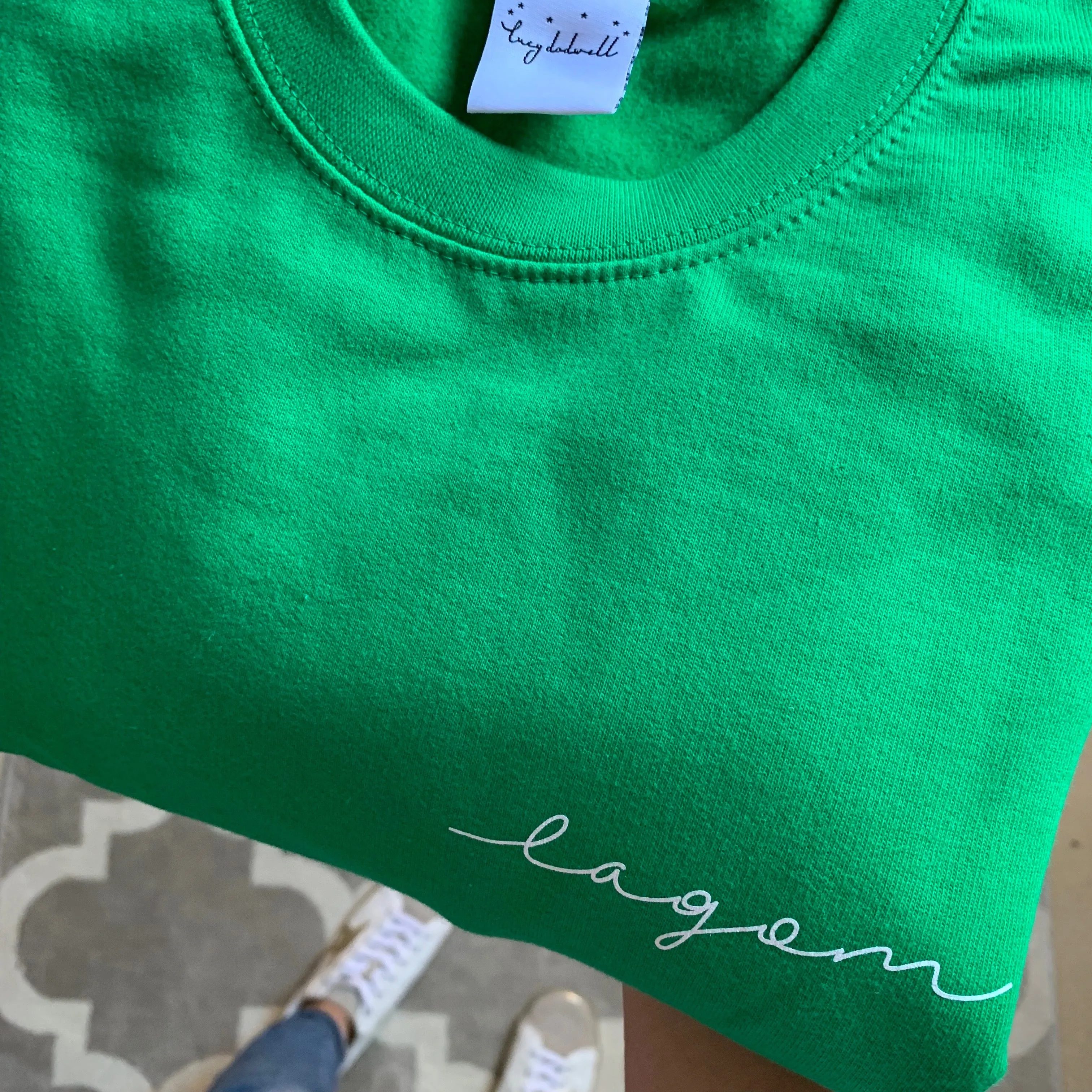 LAGOM on bright green sweatshirt