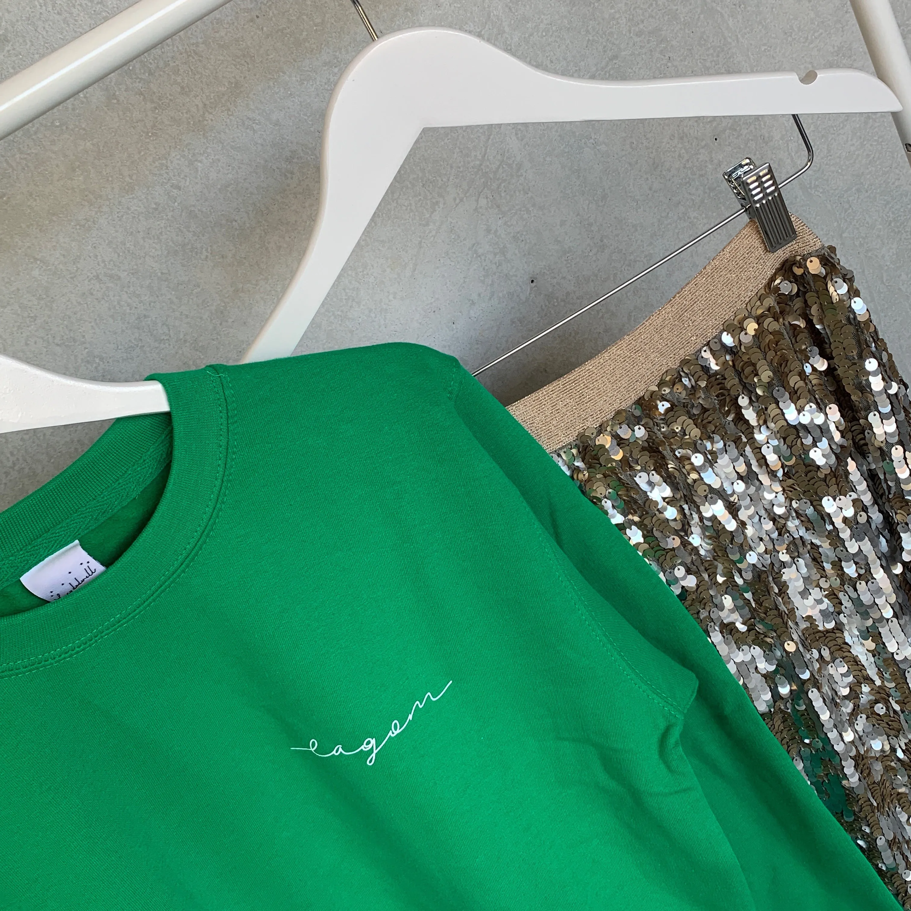 LAGOM on bright green sweatshirt