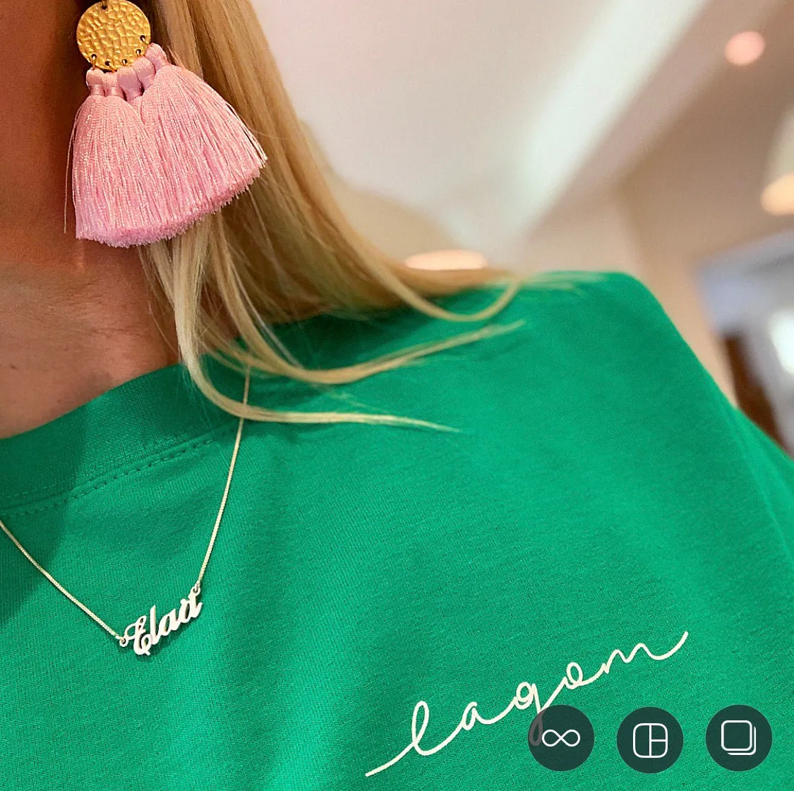 LAGOM on bright green sweatshirt